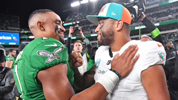 Oct 22, 2023; Philadelphia, Pennsylvania, USA; Philadelphia Eagles quarterback Jalen Hurts (1) and Miami Dolphins quarterback Tua Tagovailoa (1) meet on the field after Eagles win at Lincoln Financial Field.
